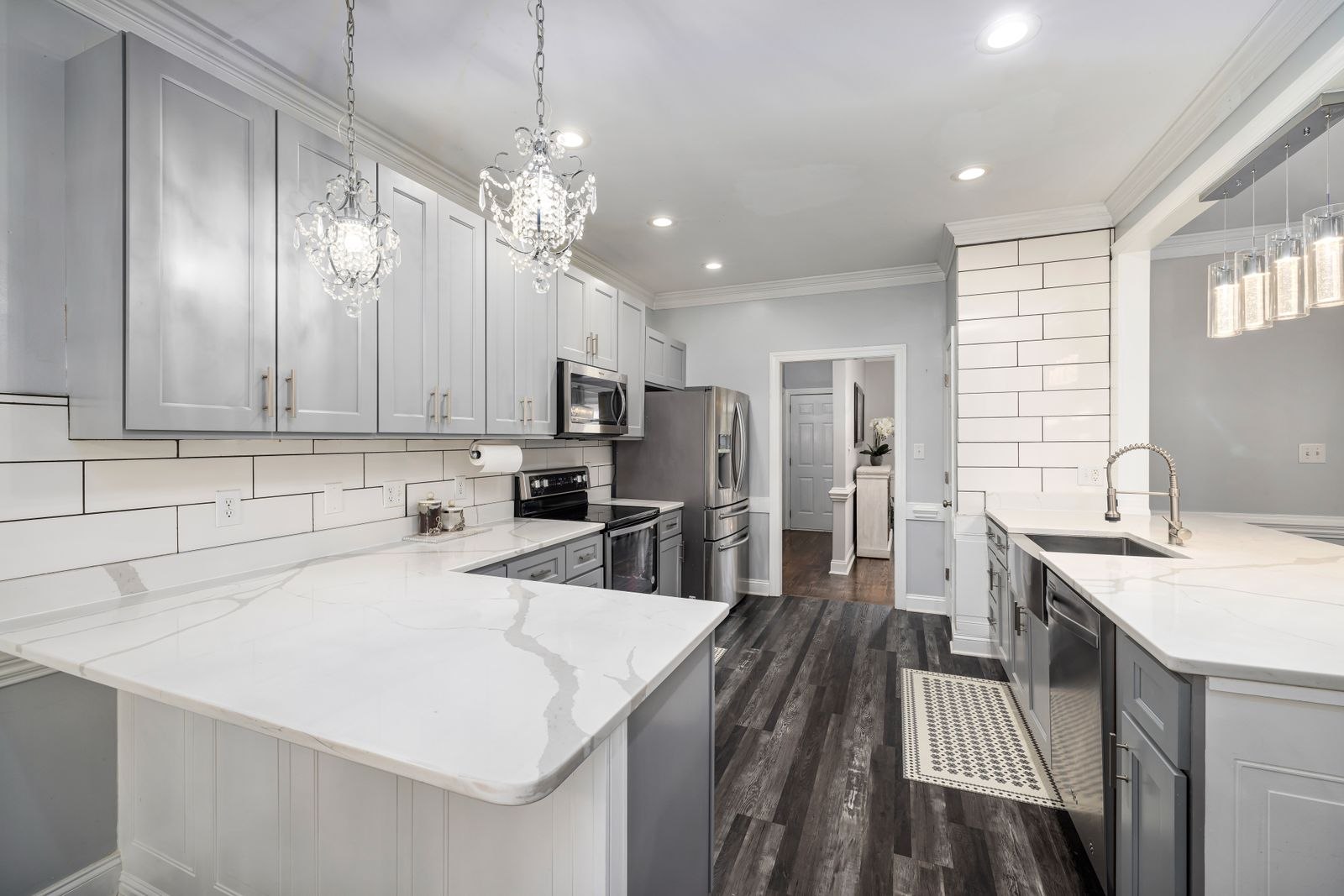 Light-filled kitchen with clean counters and warm natural details