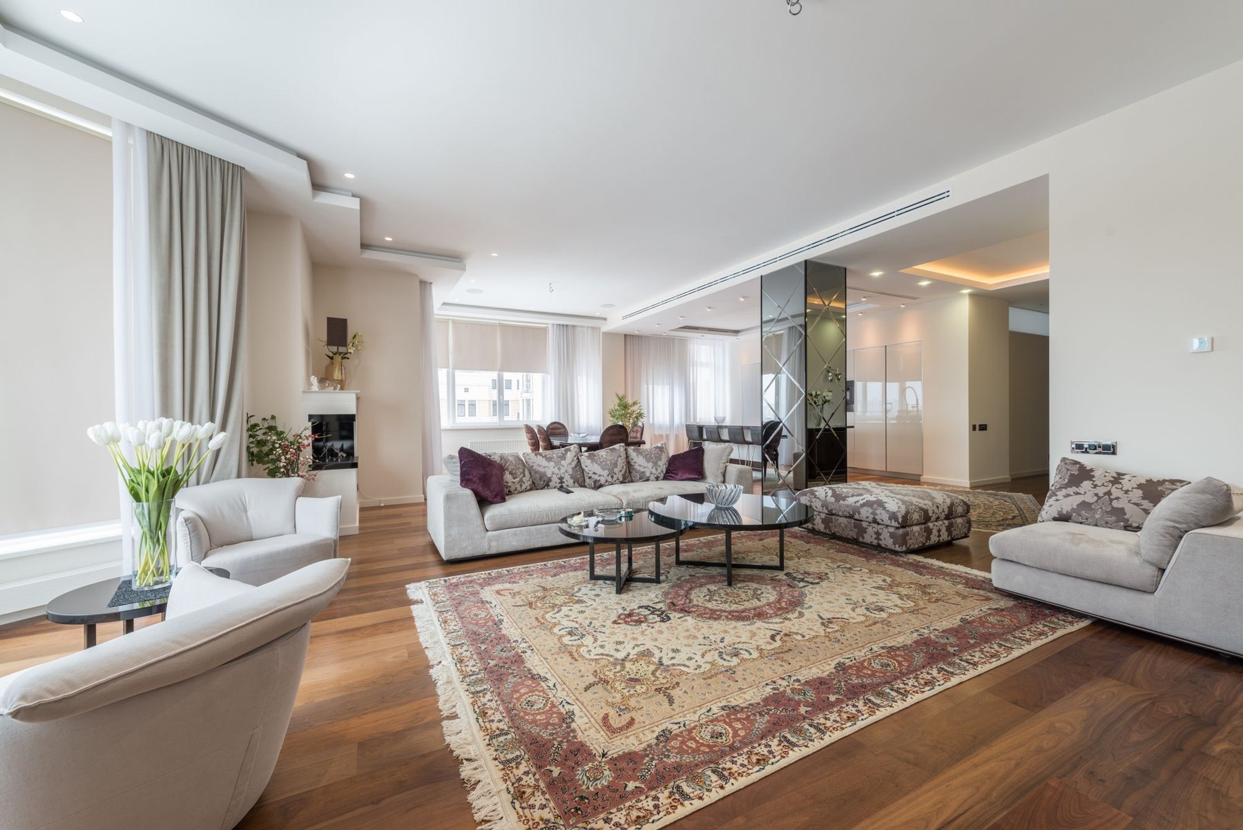 Sunlit living room with an inviting, carefully styled interior